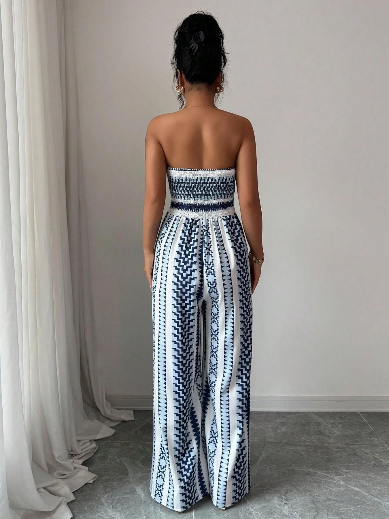 📢📢50% OFF !! ⏰Geometric Jumpsuit with Halter Neckline & Side Slit – Unique print & elastic back – Versatile, perfect for summer parties or resort wear ✨