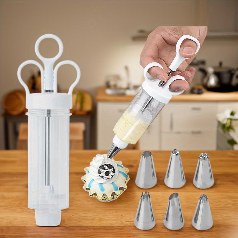 🎉 2026 Sale — Over 21,000 Sold! 🧁✨ Stop wrestling with messy piping bags — this stainless steel decorating gun fills, frosts, and finishes in seconds. 18 tips, one tool, endless creativity. 🍰