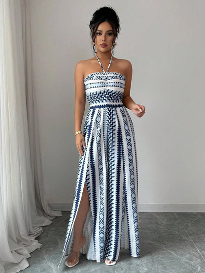 📢📢50% OFF !! ⏰Geometric Jumpsuit with Halter Neckline & Side Slit – Unique print & elastic back – Versatile, perfect for summer parties or resort wear ✨