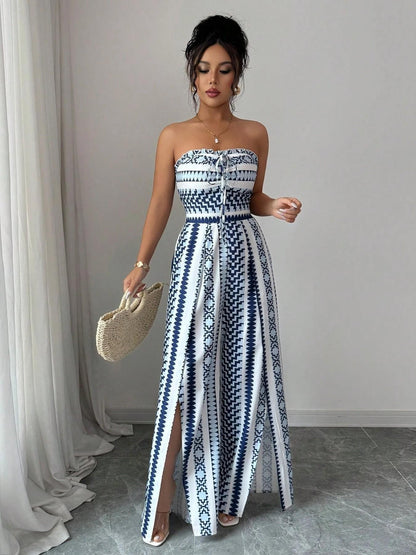 📢📢50% OFF !! ⏰Geometric Jumpsuit with Halter Neckline & Side Slit – Unique print & elastic back – Versatile, perfect for summer parties or resort wear ✨