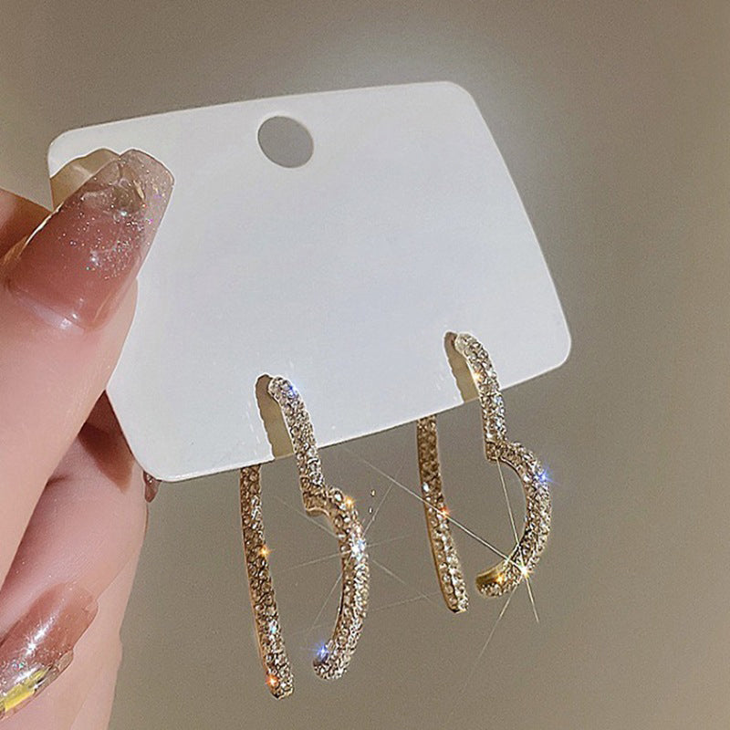 Women’s Sparkling Gold Heart Earrings